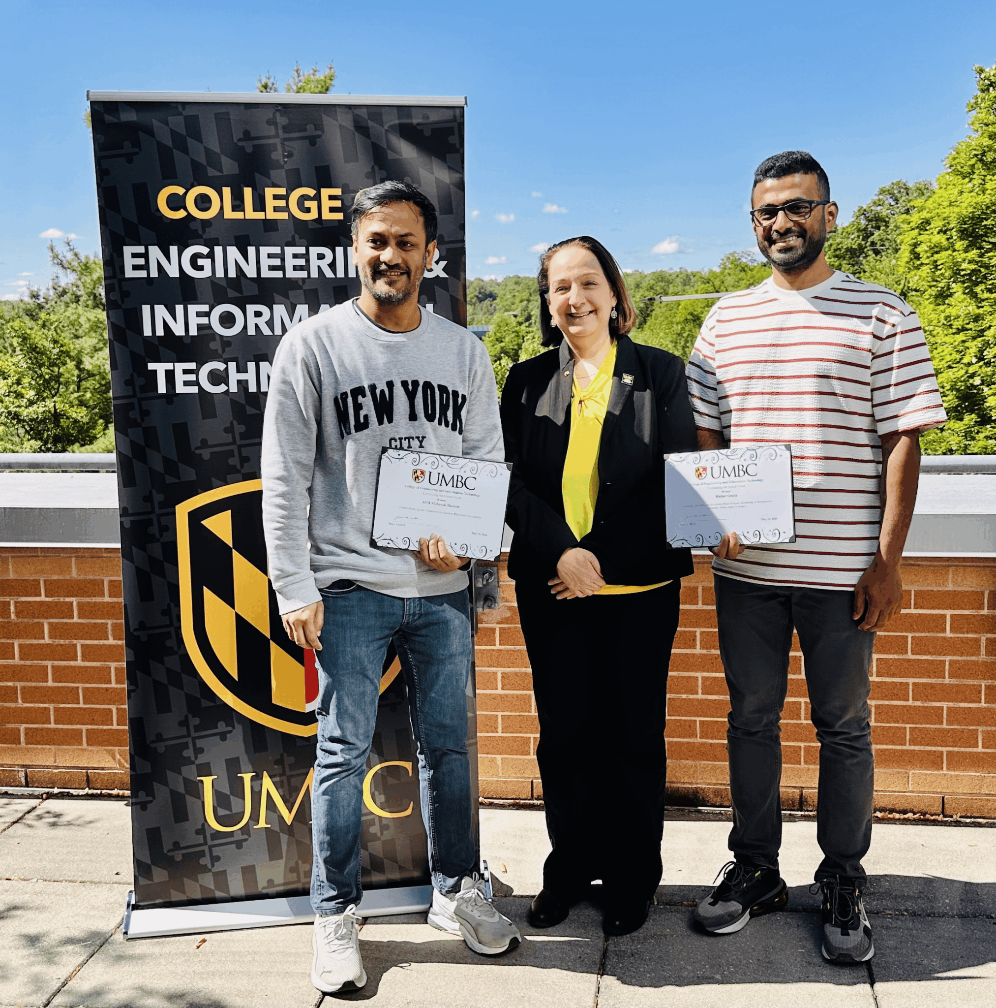 Rishav receiving the COEIT Computing for Social Good Award